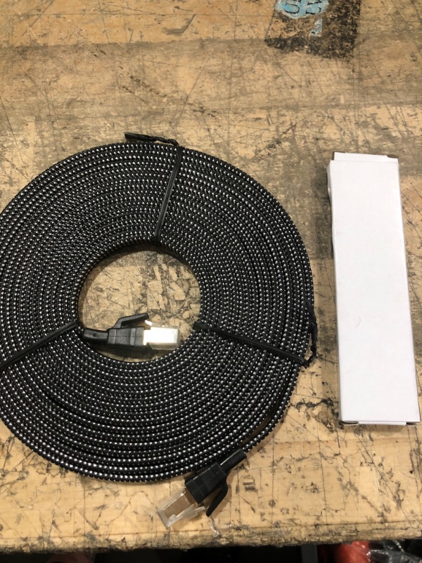 Photo 1 of CAt 7 10 g Ethernet Ultra Flat Braided Cable  Black/White 25 ft.