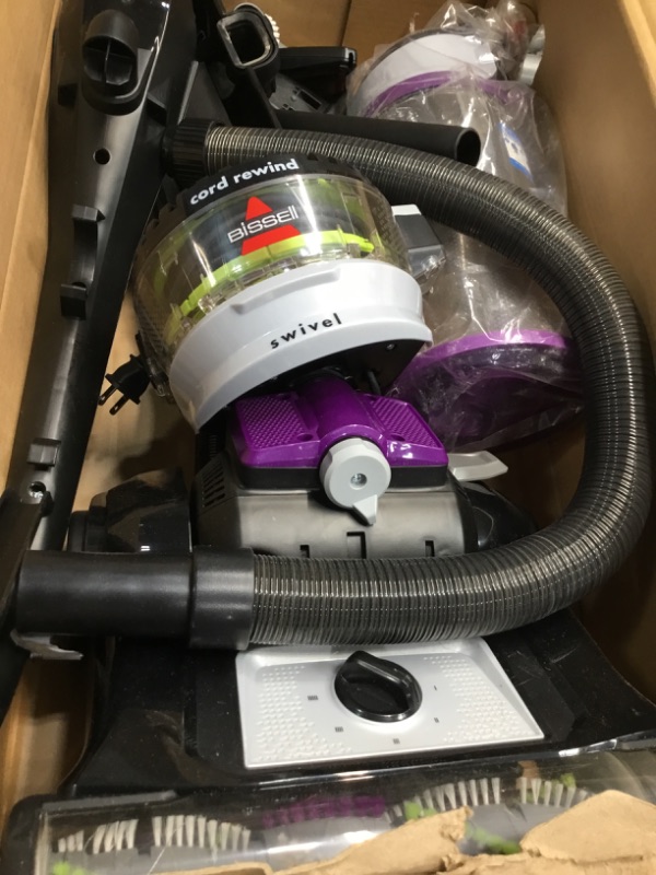 Photo 1 of Bissell 22543 Clean view Swivel Rewind Pet Vacuum And Carpet Cleaner, Purple
