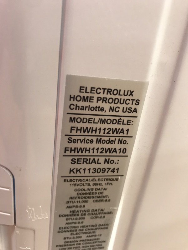 Photo 6 of PARTS ONLY 
NOT FUNTIONAL DID NOT BLOW COLD 
Frigidaire Window Air Conditioner, 11,000 BTU with Supplemental Heat and Slide Out Chassis, in White