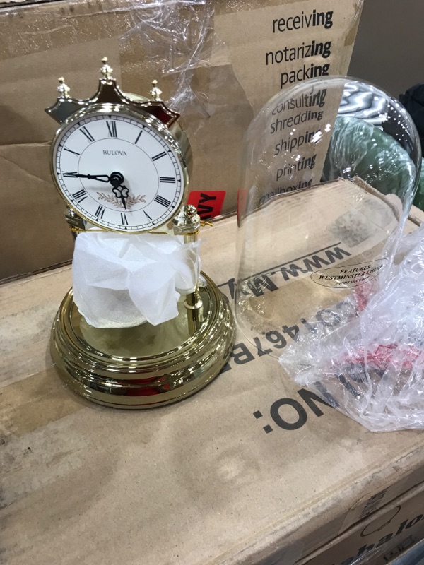 Photo 2 of Bulova 9 in. H X 6 in. W Table Clock with Westminster Chime and Gold, Brass
**MISSING BACK LID FOR BATTERIES **