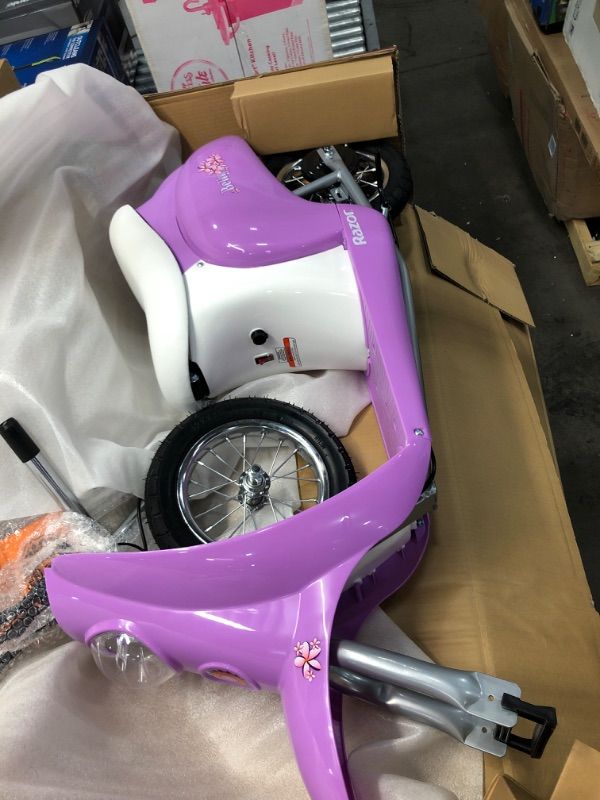 Photo 1 of Razor 24V Pocket Mod Betty Powered Ride-on - Purple
