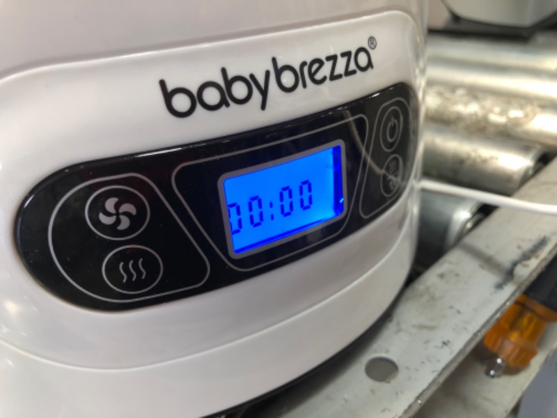 Photo 2 of USED AND NEEDS CLEANING 
Baby Brezza Electric Baby Bottle Sterilizer and Dryer Machine â?? Steam Sterilizer - Universal Fit Steamer - Sterilizes Pacifiers Glass Plastic
