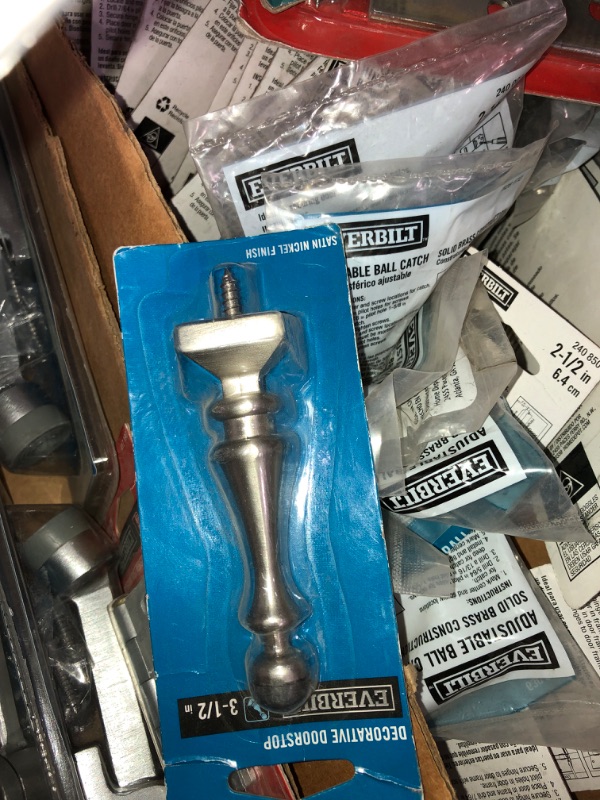 Photo 21 of **SOLD AS IS**-Pallet of assorted home improvement hardware, door stoppers, door spring stoppers and hardware , assorted colors ,sizes and design