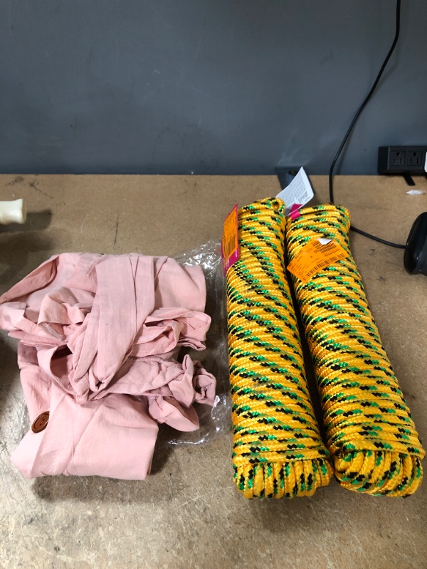 Photo 1 of Bundle of woman clothing size s and rope