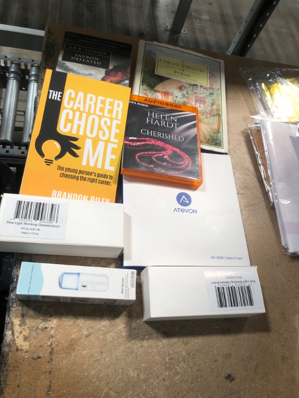 Photo 1 of ** AMAZON BUNDLE OF BOOKS/AUDIOBOOK, GLASSES, AND CABLE 