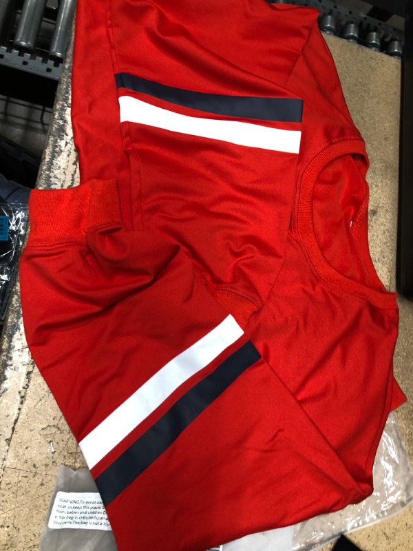 Photo 1 of BUNDLE OF RED LONG SLEEVE XL AND WOMENS TIGHTS SIZE SMALL.