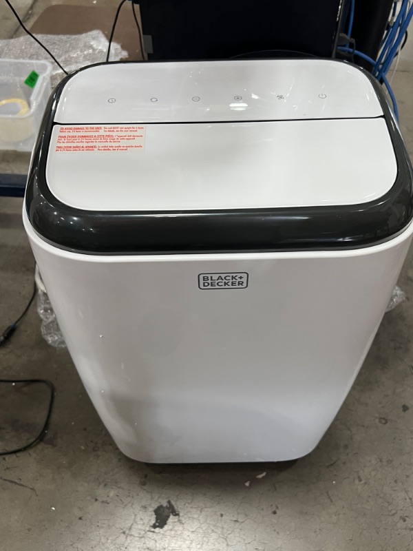 Photo 2 of *DAMAGED* BLACK+DECKER 14,000 BTU Portable Air Conditioner with Heat and Remote Control, White
