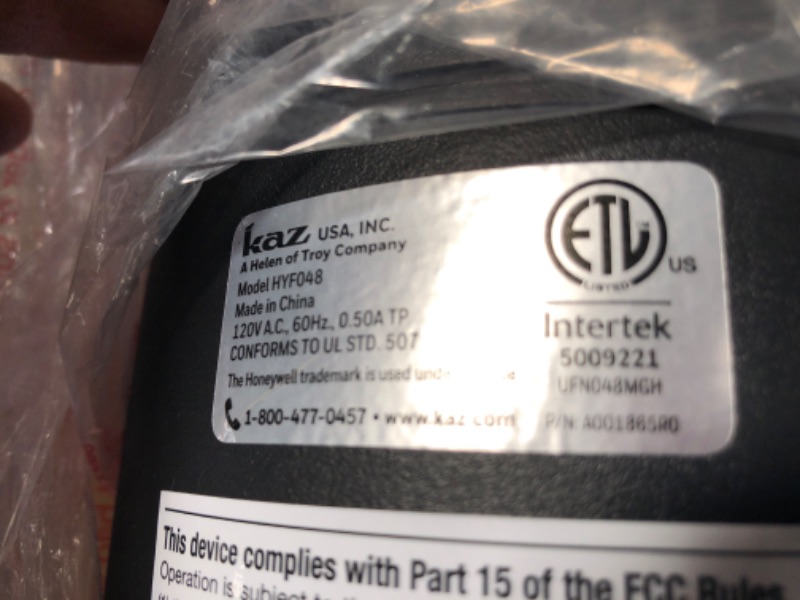 Photo 1 of Honeywell HYF048 Fresh Breeze Tower Fan with Remote Control and Programmable Thermostat, Timer Shut-Off Function & Dust Filter, Black
