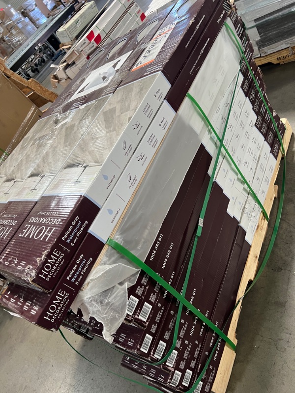 Photo 7 of ***PALLET OF 52  CASES ***   Pelican Gray 7 in. W x 48 in. L Rigid Core Click Lock Luxury Vinyl Plank Flooring (23.77 sq. ft./case)
