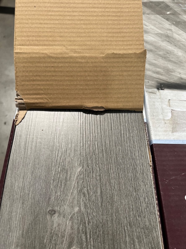 Photo 3 of ***PALLET OF 52  CASES ***   Pelican Gray 7 in. W x 48 in. L Rigid Core Click Lock Luxury Vinyl Plank Flooring (23.77 sq. ft./case)
