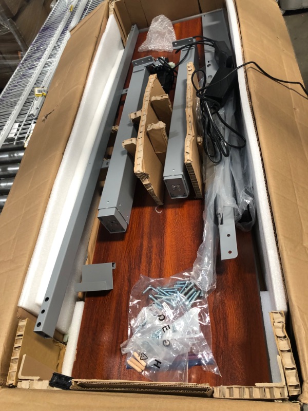Photo 1 of (DAMAGED TABLE; BENT METAL) FLEXISPOT EG1 Essential Standing Desk 55 x 28 Inches Height Adjustable Desk Electric Sit Stand Up Desk with Splice Board Home Office Desks 55 x 28 Inches Vici (Gray Frame + Mahogany Top)

