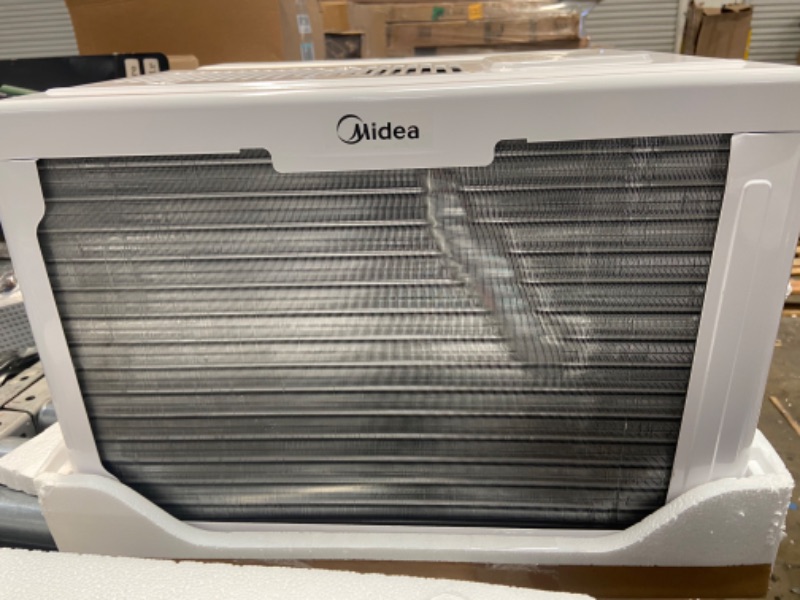 Photo 5 of **NEW*- Midea 12,000 BTU U-Shaped Smart Inverter Window Air Conditioner–Cools up to 550 Sq. Ft., Remote Control- BLOWS COLD
