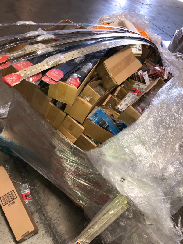 Photo 1 of -NONREFUNDABLE -SOLD AS IS ! Pallet of assorted door stoppers ,hinges , wall posts , sling door stoppers , solid and vanished stoppers , assorted styles, sizes and colors 