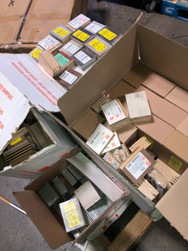 Photo 1 of -NONREFUNDABLE -SOLD AS IS ! 
Pallet of assorted Pergo Outlast Waterproof Laminate Wood Flooring vinyl samples, assorted colors and sizes, more than 15 different shades 