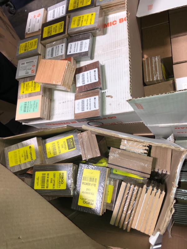 Photo 4 of -NONREFUNDABLE -SOLD AS IS ! 
Pallet of assorted Pergo Outlast Waterproof Laminate Wood Flooring vinyl samples, assorted colors and sizes, more than 15 different shades 