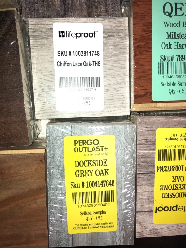 Photo 15 of -NONREFUNDABLE -SOLD AS IS ! 
Pallet of assorted Pergo Outlast Waterproof Laminate Wood Flooring vinyl samples, assorted colors and sizes, more than 15 different shades 