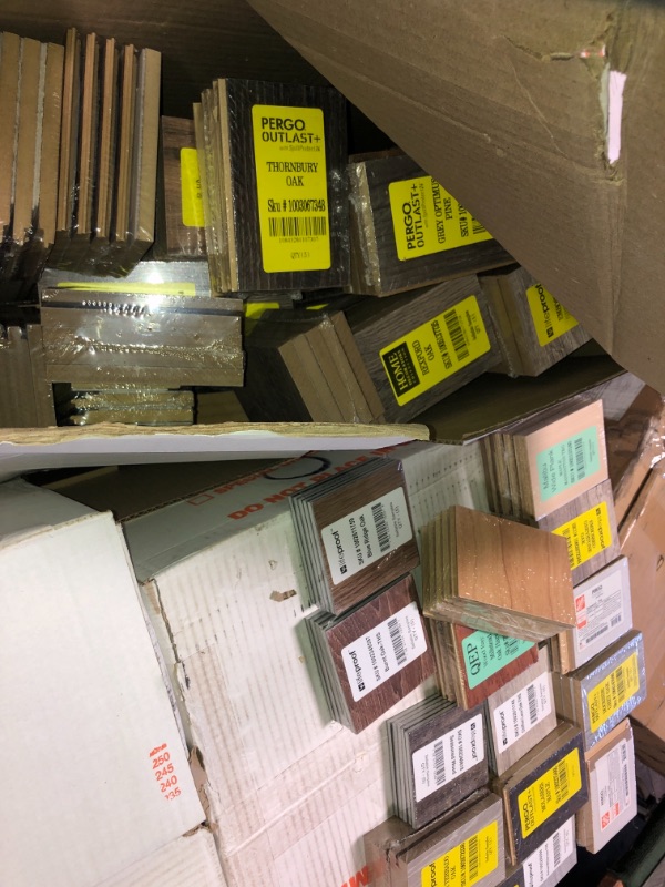 Photo 9 of -NONREFUNDABLE -SOLD AS IS ! 
Pallet of assorted Pergo Outlast Waterproof Laminate Wood Flooring vinyl samples, assorted colors and sizes, more than 15 different shades 