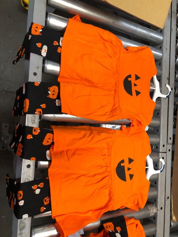 Photo 1 of 5T Girls' Short Sleeve Pumpkin Top & Halloween Leggings Set - Cat & Jack 2 sets 