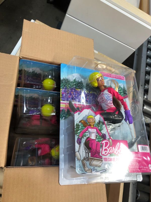 Photo 1 of 4 pack - Barbie Winter Sports para Alpine Skier Brunette Doll (12 in) with Shirt, Pants, Helmet, Gloves, Pole, Sit Ski & Trophy, Great Gift for Ages 3 and Up
