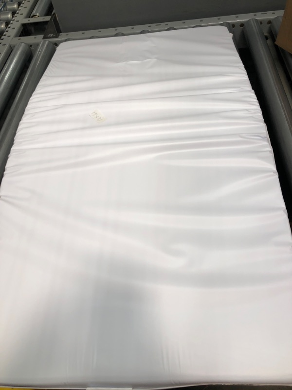 Photo 1 of **MINOR CUT** 17 X 31IN BABY FOAM MAT