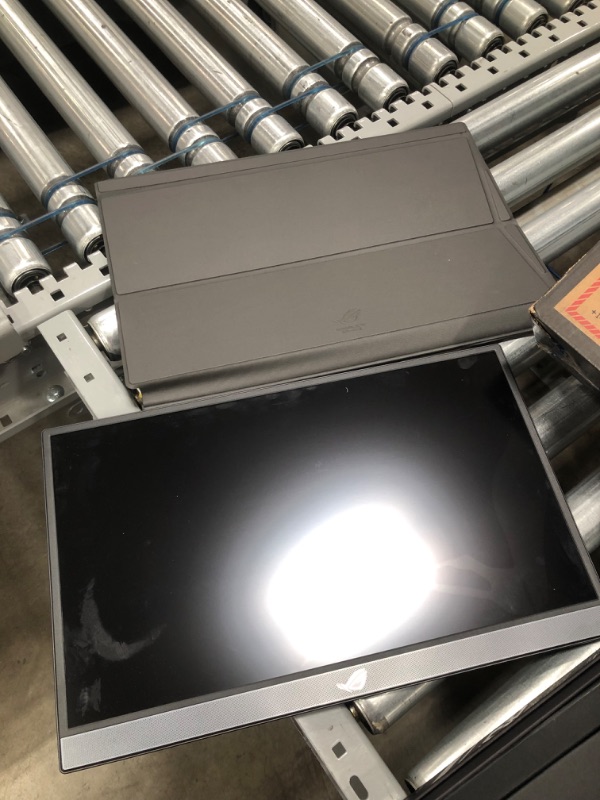 Photo 1 of *selling for PARTS, NO RETURNS*
ASUS ROG Strix 17.3" 1080P Portable Gaming Monitor (XG17AHPE) - Full HD, IPS, 240Hz, 3ms, Adaptive-Sync, Smart Case, Ultra-slim, USB-C Power Delivery, Micro HDMI, For Laptop, PC, Phone, Console, Black
