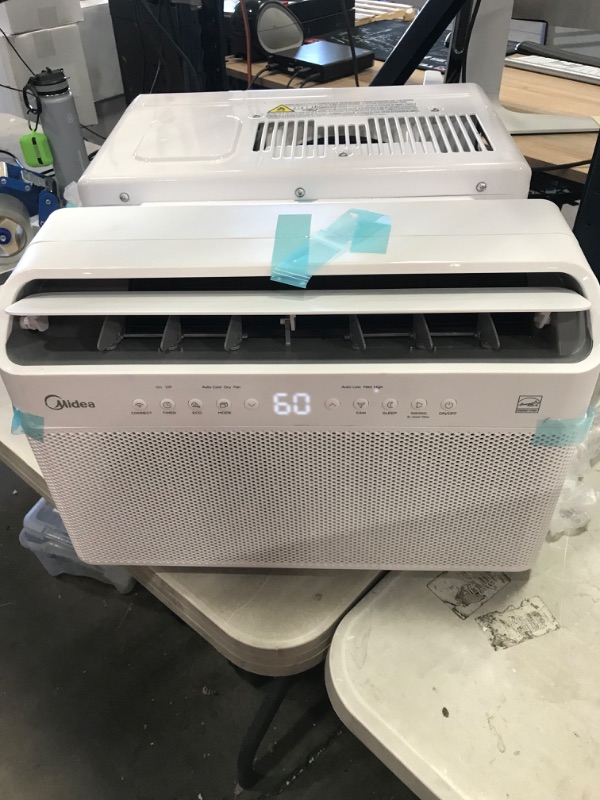 Photo 2 of parts only compressor does not come on 
Midea 8,000 BTU U-Shaped Smart Inverter Window Air Conditioner–Cools up to 350 Sq. Ft., Ultra Quiet with Open Window Flexibility, Works with Alexa/Google Assistant, 35% Energy Savings, Remote Control