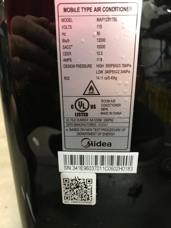 Photo 7 of PARTS ONLY COMPRESSOR DOES NOT WORK 
Midea Duo 12,000 BTU (10,000 BTU SACC) HE Inverter Ultra Quiet Portable Air Conditioner, Cools up to 450 Sq. Ft., Works with Alexa/Google Assistant, Includes Remote Control & Window Kit