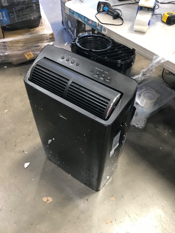 Photo 2 of PARTS ONLY 
Midea Duo 12,000 BTU (10,000 BTU SACC) HE Inverter Ultra Quiet Portable Air Conditioner, Cools up to 450 Sq. Ft., Works with Alexa/Google Assistant, Includes Remote Control & Window Kit