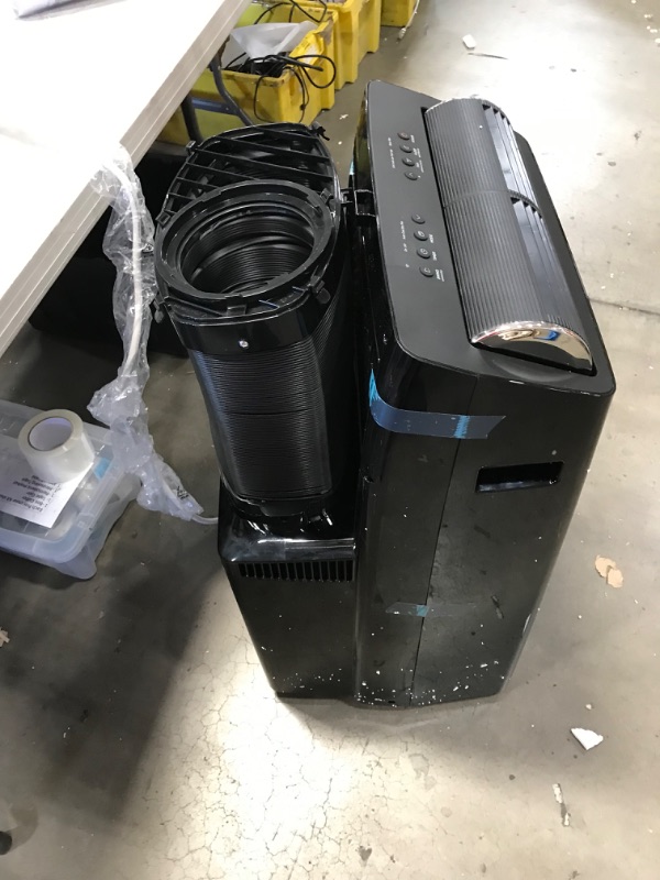 Photo 3 of PARTS ONLY 
Midea Duo 12,000 BTU (10,000 BTU SACC) HE Inverter Ultra Quiet Portable Air Conditioner, Cools up to 450 Sq. Ft., Works with Alexa/Google Assistant, Includes Remote Control & Window Kit