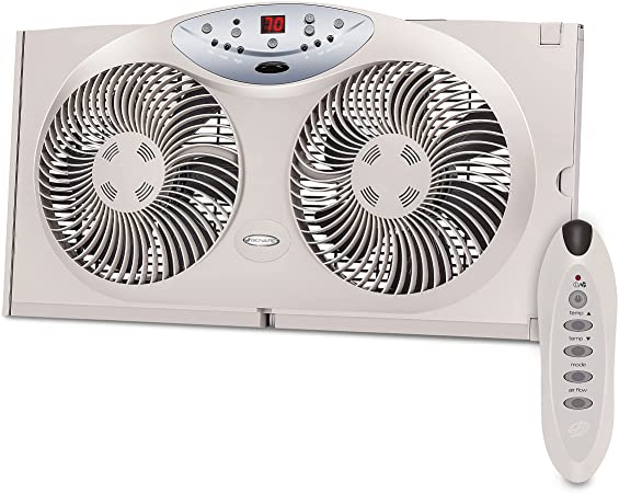 Photo 1 of Bionaire Window Fan with Twin 8.5-Inch Reversible Airflow Blades and Remote Control, White