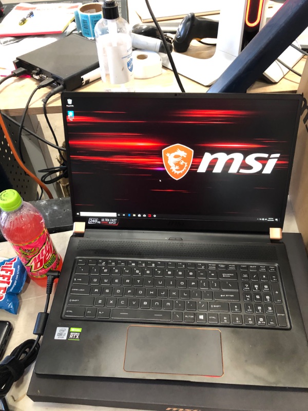 Photo 2 of MSI GS75 Stealth 10SF-609 17.3" Gaming Notebook - Core i7-10875H - 32GB RAM - 512GB SSD - 1920 x 1080 - NVIDIA GeForce RTX 2070 Max-Q - Windows 10 Pro - Matte Black with Gold Diamond