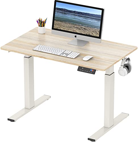 Photo 1 of **HAS DAMAGE ON THE CORNERS**
SHW Memory Preset Electric Height Adjustable Standing Desk, 40 X 24 Inches, Maple
