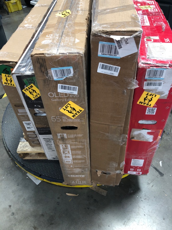 Photo 1 of MIXED PALLET OF DAMAGED TVS**MIXED SIZES**NO REFUNDS** 