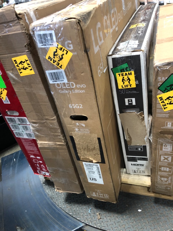 Photo 1 of MIXED PALLET OF DAMAGED TVS**MIXED SIZES**NO REFUNDS** 