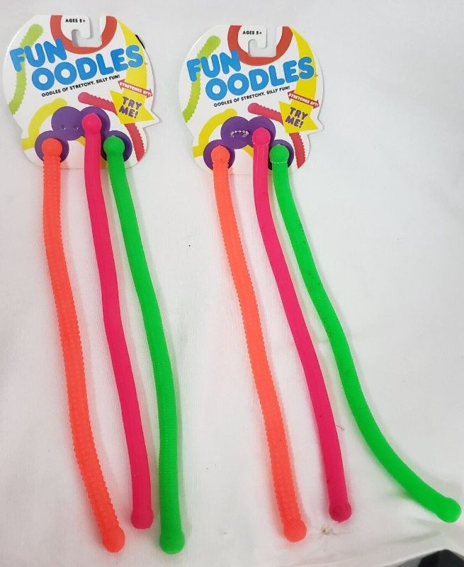 Photo 1 of **BOX OF 32** Fun Oodle Stretchy, 3 Count Pack Stretches Out to 8 Foot B3354, 2 Count
