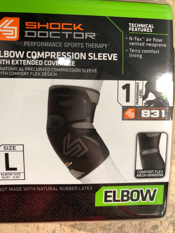 Photo 1 of ***SIZE L. COLOR: BLK,GREY***ELBOW COMPRESSION SLEEVE WIT HEXTENDED COVERAGE 