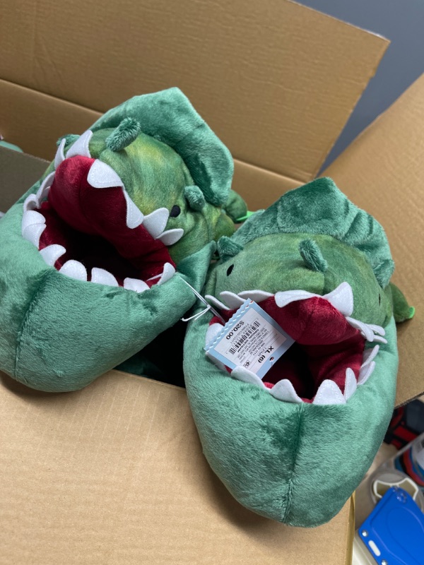 Photo 2 of Boys' Dylan Dinosaur Slippers - Cat & Jack™ Green
XL
**CASE OF 6

