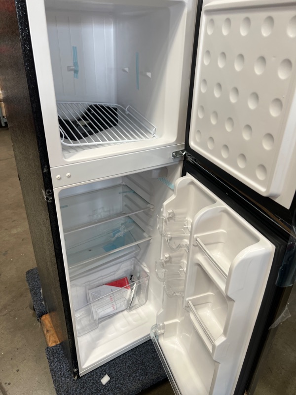 Photo 3 of Frigidaire EFR451 2 Door Refrigerator/Freezer, 4.6 cu ft, Platinum Series, Stainless Steel, Double
MINOR DENTS IN THE CORNERS