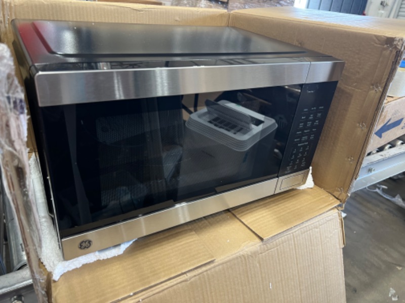 Photo 3 of ***PARTS ONLY*** GE 3-in-1 Countertop Microwave Oven | Complete With Air Fryer, Broiler & Convection Mode | 1.0 Cubic Feet Capacity, 1,050 Watts | Kitchen Essentials for the Countertop or Dorm Room | Stainless Steel
