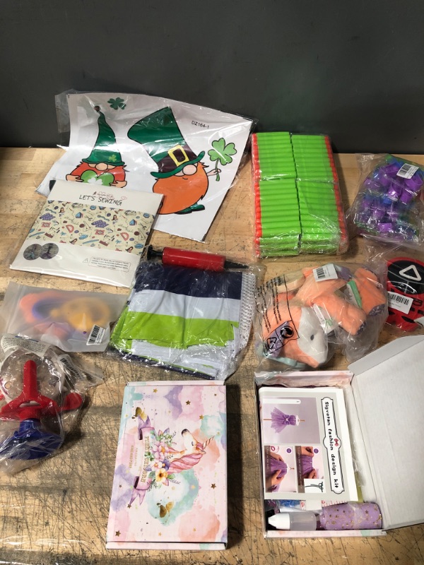 Photo 1 of **N0N-REFUNDABLE**Assorted Amazon Toy Bundle, Unisex Sensory, Costume 4-6y, and Party Decorations
