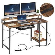 Photo 1 of Rolanstar Computer Desk with Power Outlet, Keyboard Tray and Monitor Stand 55 Inch
