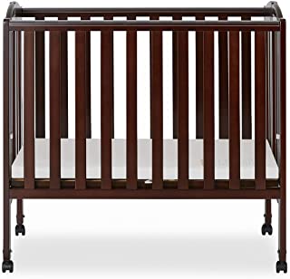 Photo 1 of Dream On Me 2-in-1 Folding Portable Mini Crib, Natural