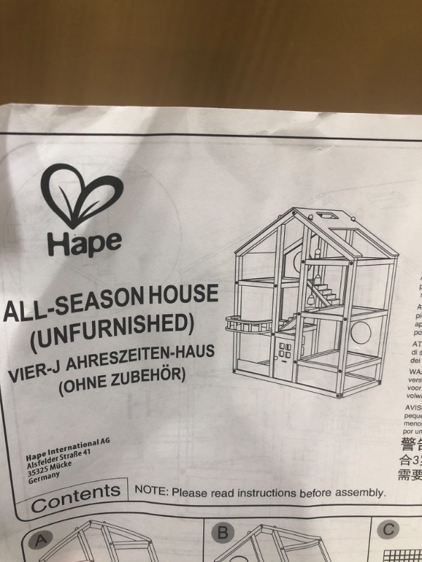 Photo 2 of All Seasons Kids Wooden Dollhouse by Hape | Award Winning 3 Story Dolls House Toy with Furniture, Accessories, Movable Stairs and Reversible Season Theme L: 23.6, W: 11.8, H: 28.9 inch
