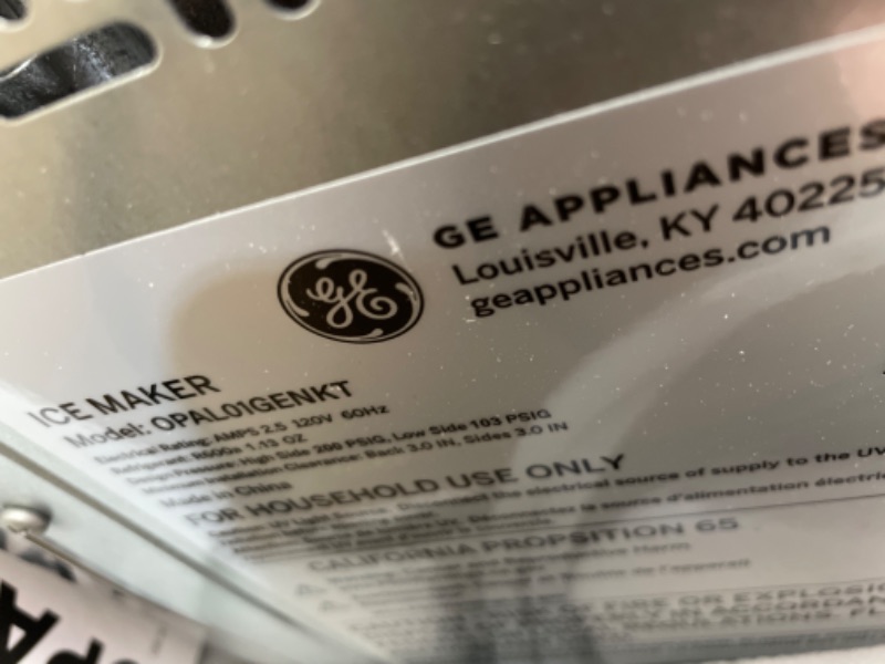 Photo 1 of GE Profile Opal | Countertop Nugget Ice Maker with Side Tank | Portable Ice Machine Makes up to 24 Lbs. of Ice per Day | Stainless Steel Finish
