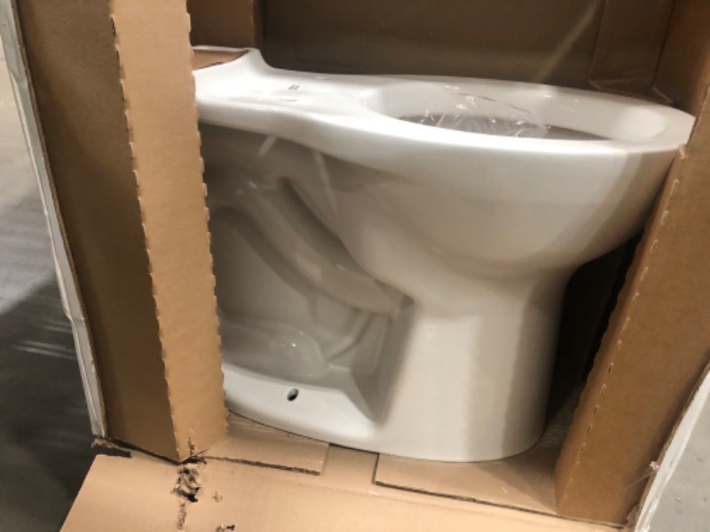 Photo 3 of **missing water tank lid and missing toilet seat**
Cadet Ovation Tall Height 2-Piece 1.28 GPF High Efficiency Single Flush Elongated Toilet in White, Seat Included