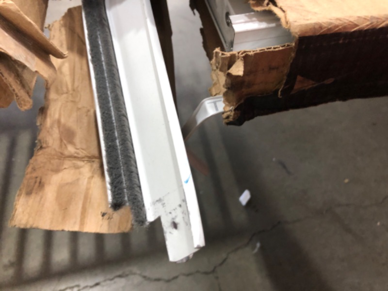 Photo 1 of 36 in. x 84 in. 2000 Series White Universal Self-Storing Aluminum Storm Door with Nickel Hardware
