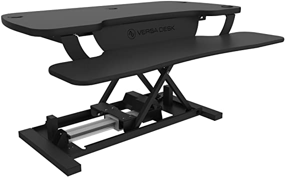 Photo 1 of VersaDesk Power Pro USA Manufactured | Electric Height-Adjustable Desk Riser | Standing Desk Converter | Sit to Stand Desktop with Keyboard + Mouse Tray | 36" X 24" | All Black
