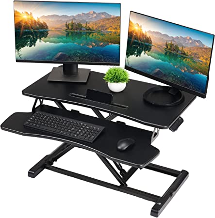 Photo 1 of TechOrbits Standing Desk Converter - 32 Inch MDF Wood Adjustable Sit to Stand Up Desk Riser - Portable Home Office Table Top Raiser - Black
