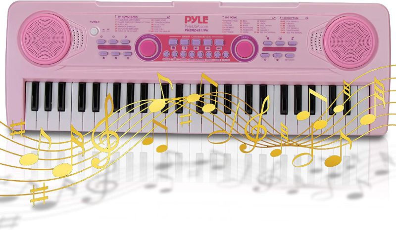 Photo 1 of Electric Keyboard Piano for Kids-Portable 49 Key Electronic Musical Karaoke Keyboard, Learning Keyboard for Children w/Drum Pad, Recording, Microphone, Built-in Speaker-Pyle PKBRD4911PK (Pink)
