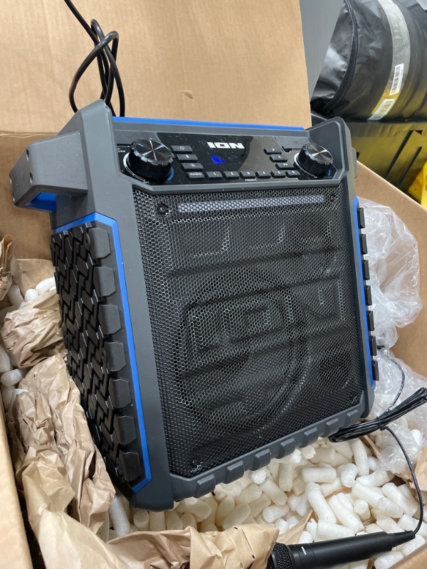 Photo 2 of ION Audio Pickup - 100-watt Water-Resistant Wireless Bluetooth Speaker with 75-hour Rechargeable Battery, AM/FM Radio and Multi-Color Light Bar
